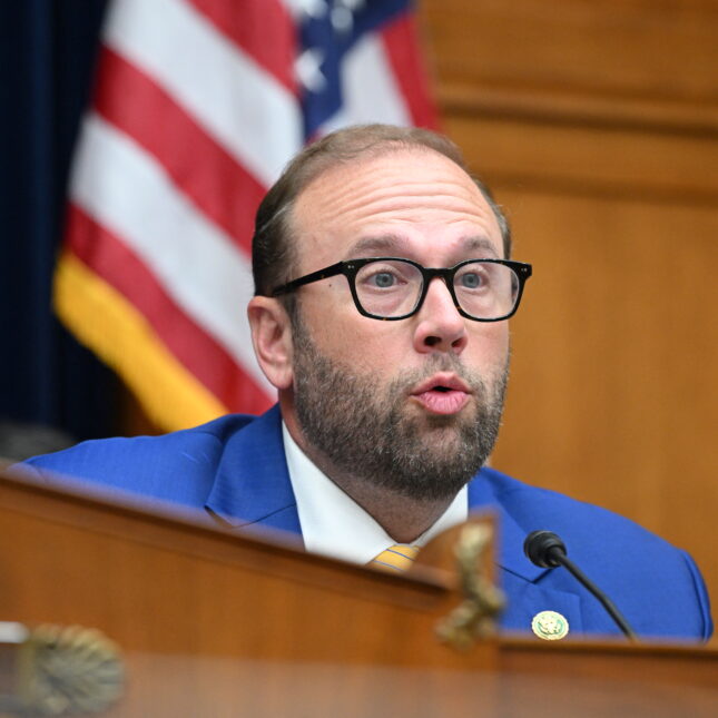 Rep. Jason Smith, wearing glasses and a blue suit jacket, speaks into a microphone at a hearing — politics coverage from STAT